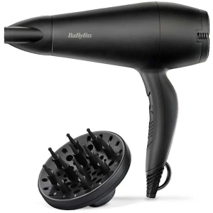 Σεσουάρ μαλλιών Babyliss D215DE, που διαθέτει υψηλή ισχύ στα 2000 watt με δυνατή ροή αέρα για γρήγορο στέγνωμα και φορμάρισμα των μαλλιών. Έχει ιονική λειτουργία, ρυθμιζόμενη θερμοκρασία, με 2 ταχύτητες, περιλαμβάνει διαχυτήρας, 3 επίπεδα θερμοκρασίας, με βύσμα ΕΕ και προϊόν Plug-in.